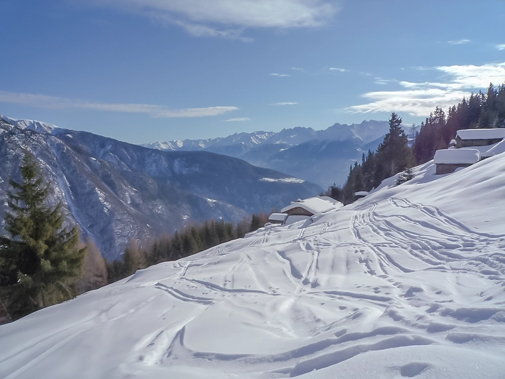 snow-capped mountain huts